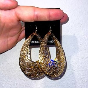 Golden hoop earrings dangle